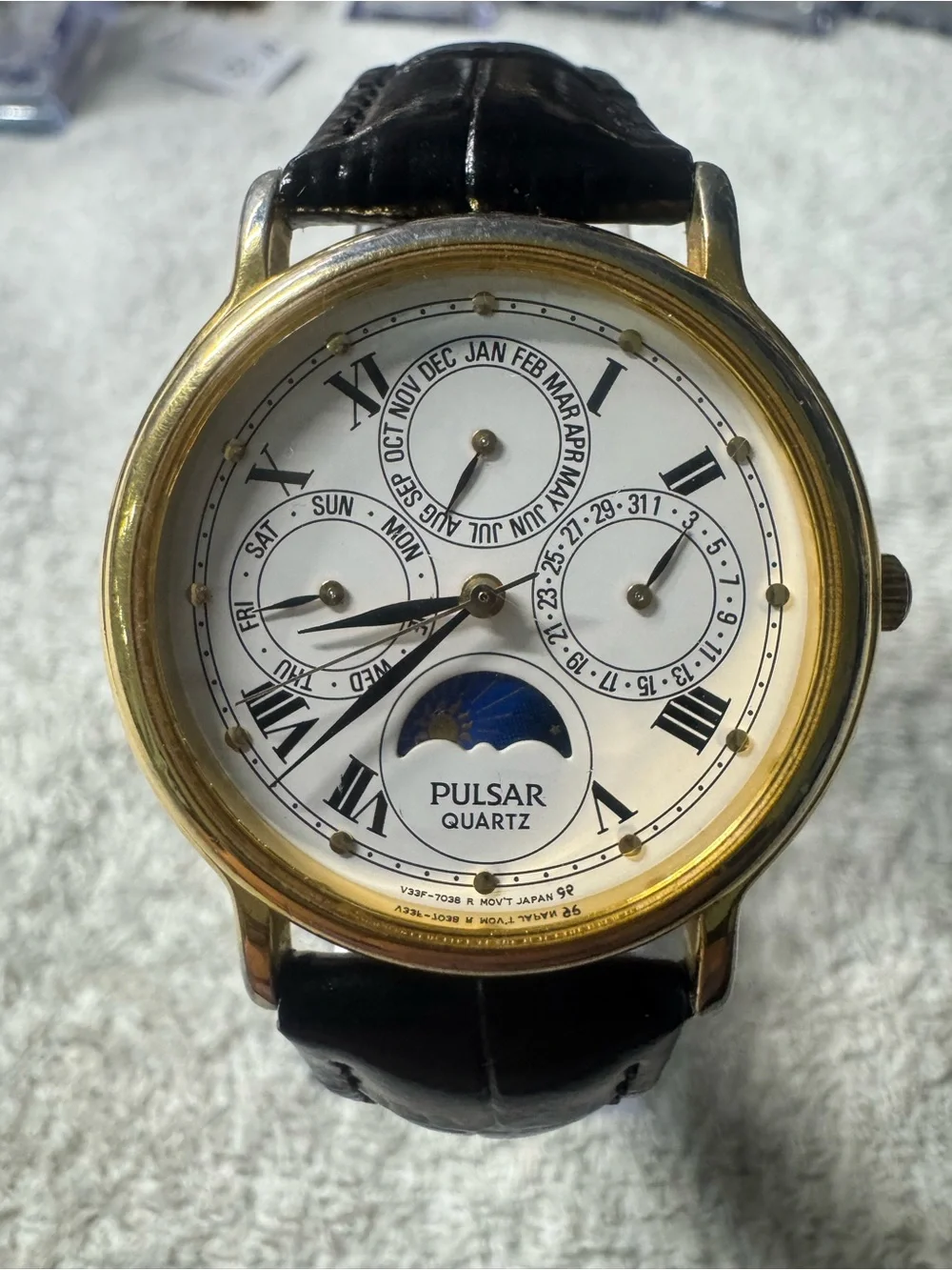 Pulsar Gold-Tone Case White Dial Black Leather Strap Moonphase Watch